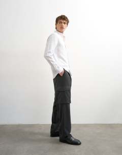 Model wearing Wide leg belted smart trouser with side pockets in charcoal