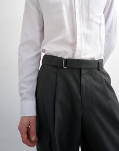 Model wearing Wide leg belted smart trouser with side pockets in charcoal