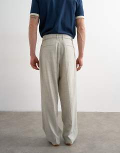 Model wearing Wide leg belted textured trouser in stone