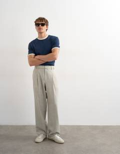 Model wearing Wide leg belted textured trouser in stone