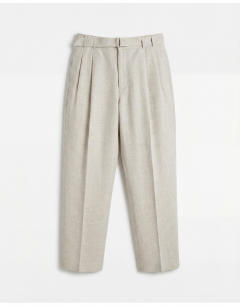 Model wearing Wide leg belted textured trouser in stone