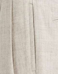 Model wearing Wide leg belted textured trouser in stone