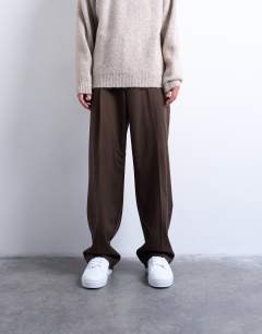 Model wearing Wide leg belted twill smart trousers in chocolate
