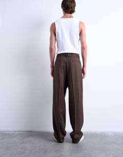 Model wearing Wide leg belted twill smart trousers in chocolate