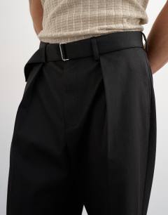 Model wearing Wide leg belted twill trouser in black