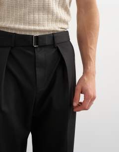 Model wearing Wide leg belted twill trouser in black