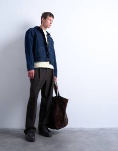 Model wearing Wide leg check smart trousers in chocolate
