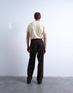 Model wearing Wide leg check smart trousers in chocolate
