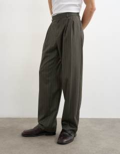 Model wearing Wide leg  herringbone stripe trouser in charcoal