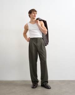 Model wearing Wide leg  herringbone stripe trouser in charcoal