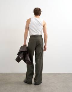 Model wearing Wide leg  herringbone stripe trouser in charcoal