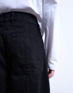 Model wearing Wide leg jean in black