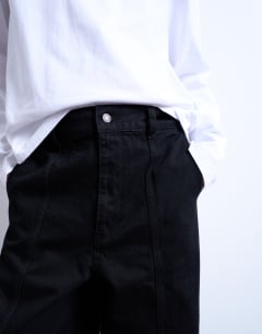 Model wearing Wide leg jean in black