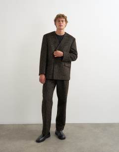 Model wearing Wide leg leopard print trouser in brown