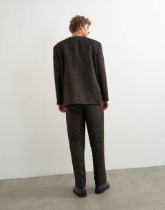 Model wearing Wide leg leopard print trouser in brown