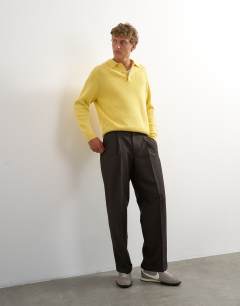Model wearing Wide leg micro check trouser with pleats in brown