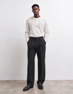 Model wearing Wide leg pinstripe trouser with pleats in charcoal