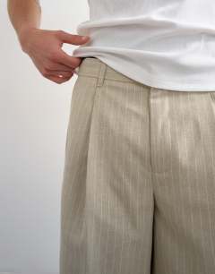 Model wearing Wide leg stripe short in stone