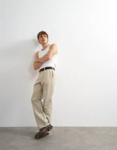 Model wearing Wide leg stripe trouser in stone