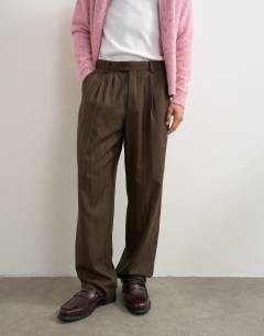 Model wearing Wide leg stripe trouser with pleats in chocolate brown