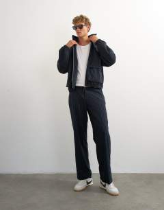 Model wearing Wide leg trouser with boucle pinstripe in navy