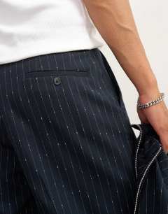 Model wearing Wide leg trouser with boucle pinstripe in navy