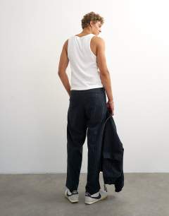 Model wearing Wide leg trouser with boucle pinstripe in navy