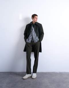 Model wearing Wool blend car coat in dark green