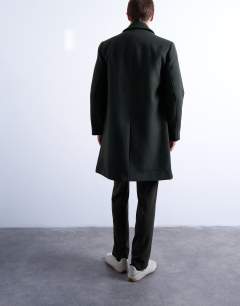 Model wearing Wool blend car coat in dark green
