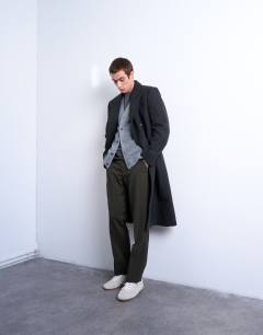 Model wearing Wool blend waisted double breasted overcoat in charcoal