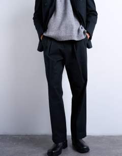 Model wearing Wool blend wide leg striped suit trouser in navy