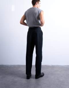 Model wearing Wool blend wide leg striped suit trouser in navy