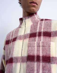 Model wearing Wool mix brushed funnel jacket in red check