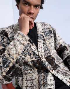 Model wearing Wool mix textured square pattern cardigan in cream & brown