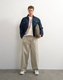 Model wearing Topman x Akilah boxy fit crop abstract scenic graphic t-shirt with embroidery in ecru