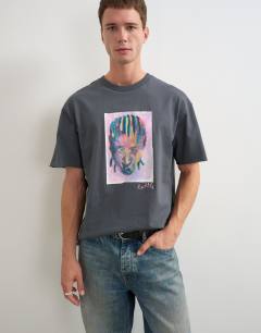 Model wearing Topman x Akilah relaxed fit abstract portrait graphic t-shirt with embroidery in charcoal