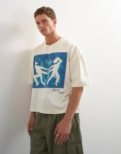 Model wearing X Jing boxy fit crop abstract breaking free graphic t-shirt with embroidery in ecru