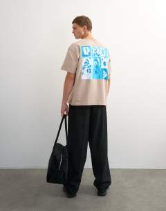 Model wearing Topman x Jing relaxed front and back mosaic graphic t-shirt with embroidery in stone