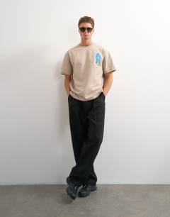 Model wearing Topman x Jing relaxed front and back mosaic graphic t-shirt with embroidery in stone
