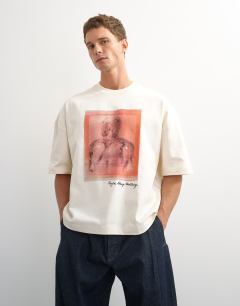 Model wearing X Paul Majek boxy fit crop abstract portrait graphic t-shirt with embroidery in ecru