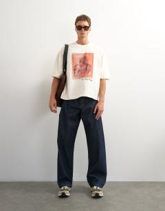 Model wearing X Paul Majek boxy fit crop abstract portrait graphic t-shirt with embroidery in ecru