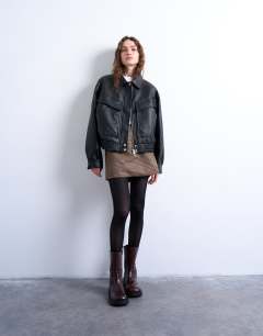 Model wearing 2 pack 50 denier tights in black