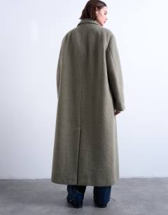 Model wearing 3 button brushed coat with wool in sage