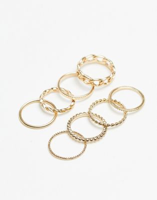 Topshop 8 pack of mixed chain rings in gold