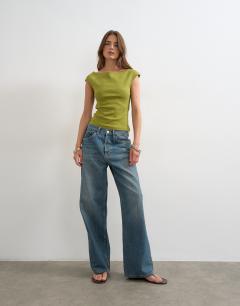 Model wearing 90's boat neck vest in green