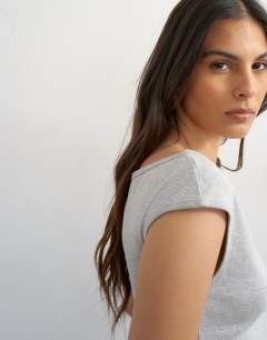Model wearing 90's boat neck vest in grey marl