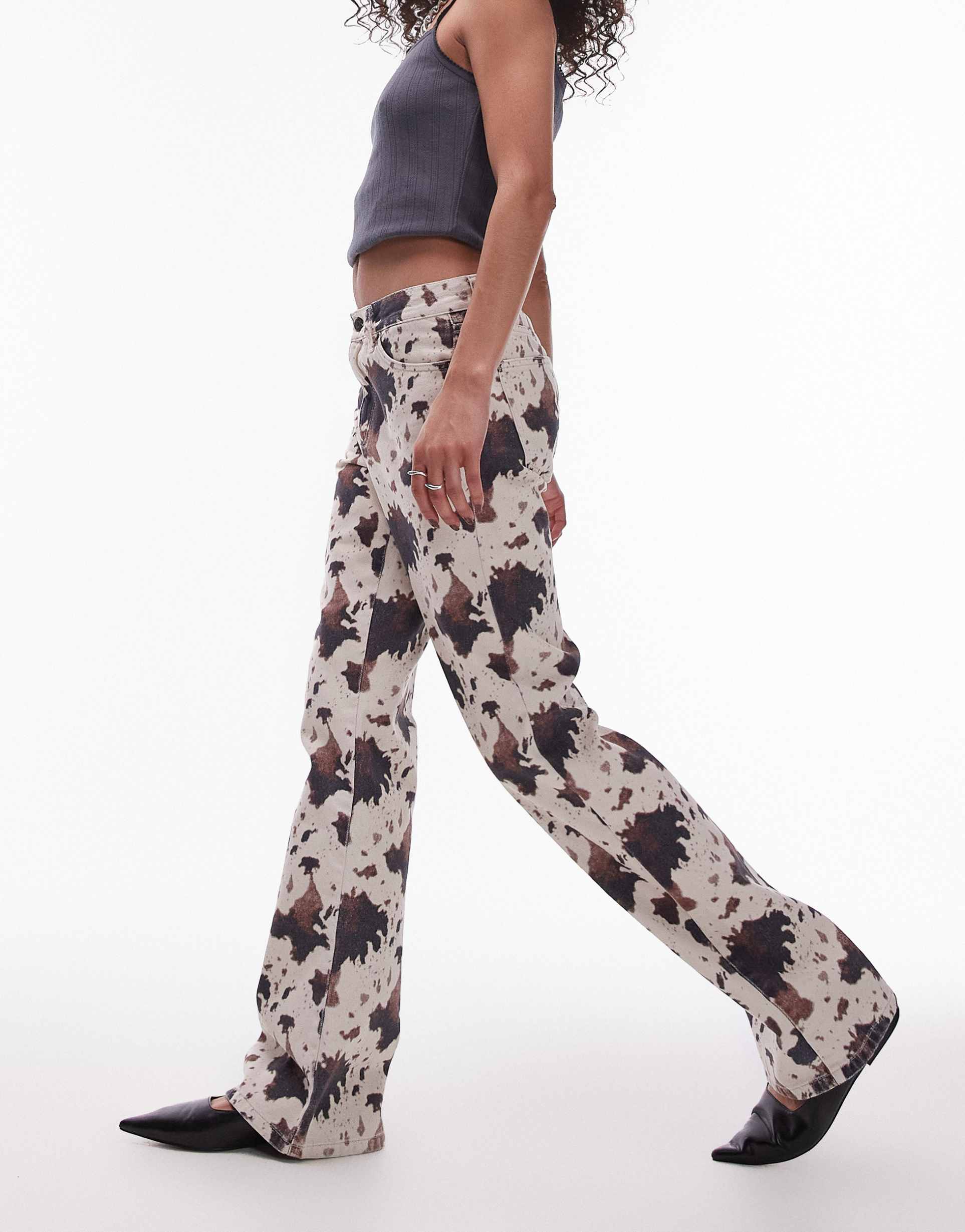 topshop 90s mid rise flare jeans in cow print