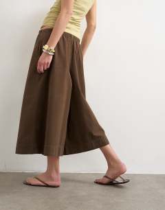 Model wearing A line culotte in chocolate