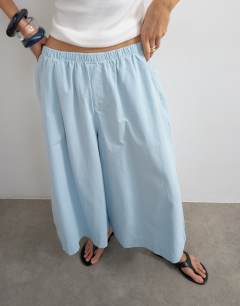 Model wearing A line culotte in cornflower blue