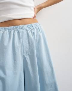 Model wearing A line culotte in cornflower blue